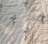 KalaIndia Flamingo Snow Baby Quilt (White) – quilts for kids (folded view)