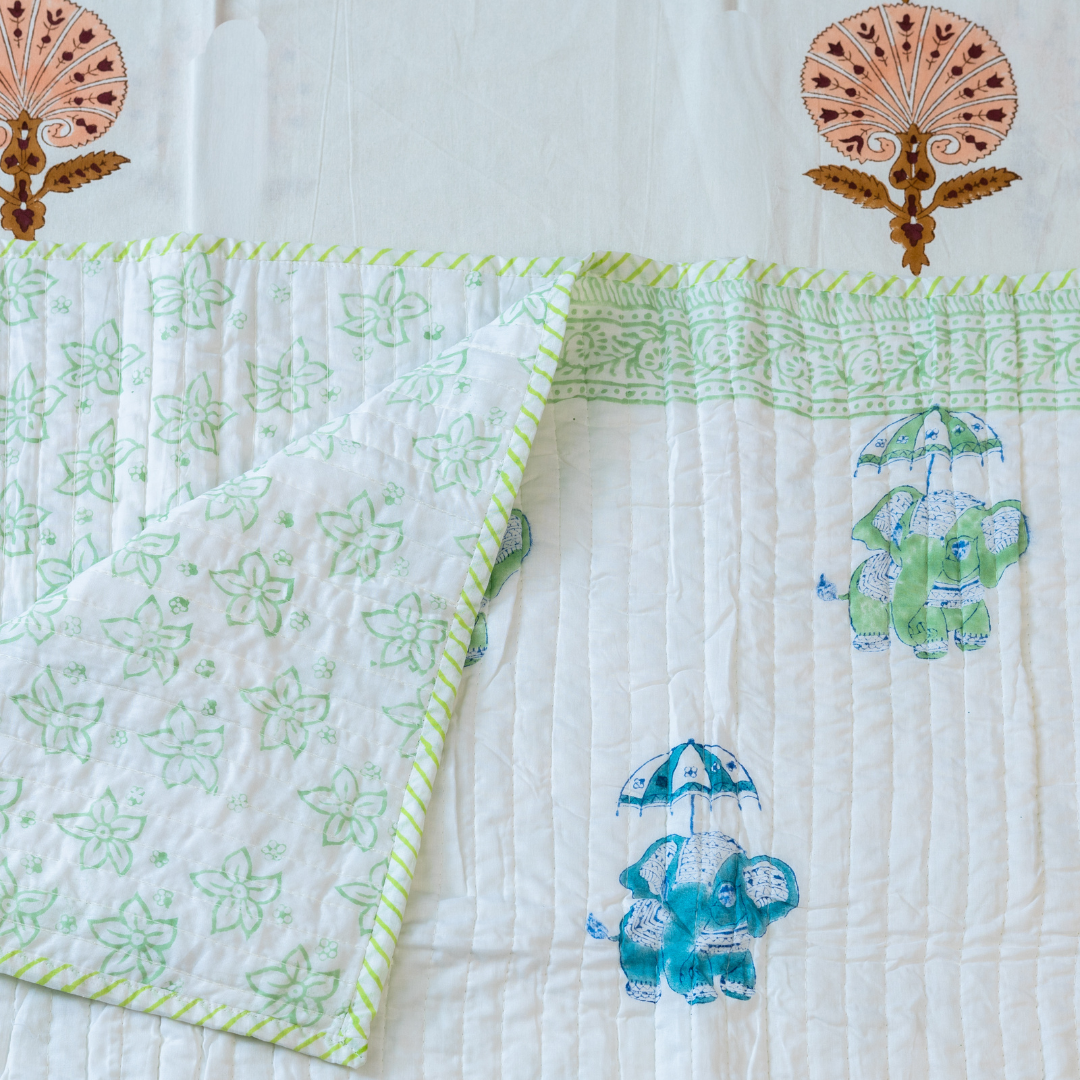 KalaIndia Elephant Joy Baby Quilt (White) – handmade baby quilts india (flat lay view)