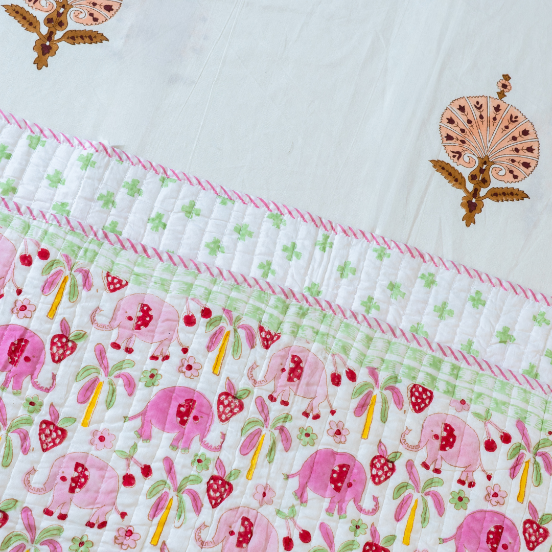 KalaIndia Elephant Meadow Baby Quilt (Pink) – quilts for kids (close-up of the print detail)