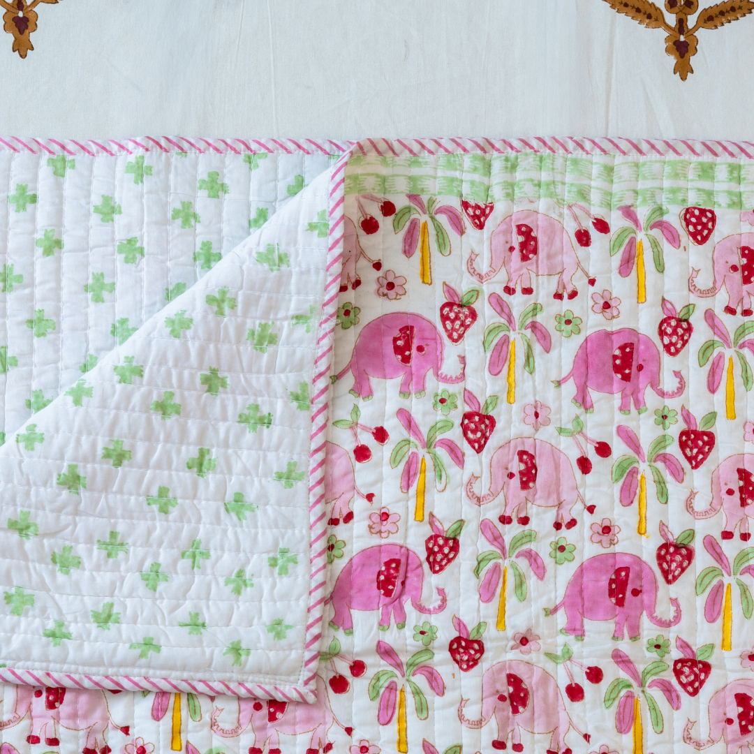 KalaIndia Elephant Meadow Baby Quilt (Pink) – quilts for kids (flat lay view)