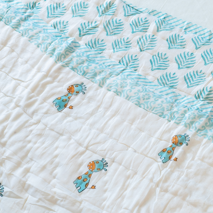 KalaIndia Giraffe Baby Quilt – quilts for kids (flat lay view)
