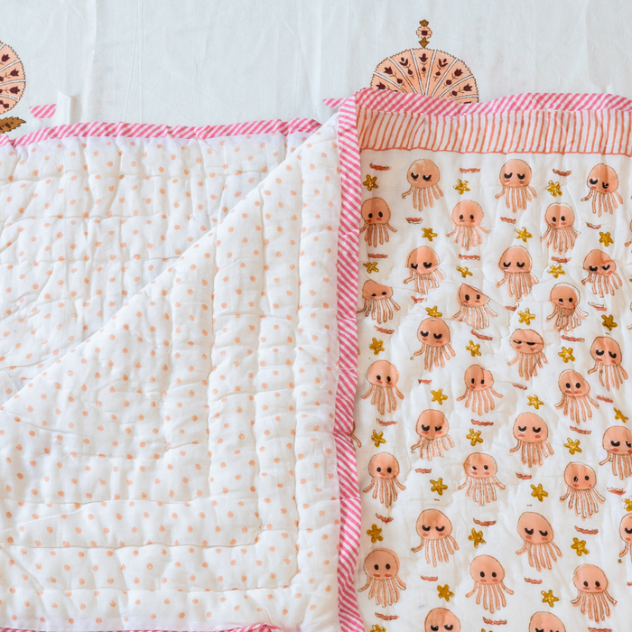 KalaIndia Jellyfish Friends Baby Quilt (Orange) – baby quilts India (flat lay view)