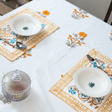 KalaIndia Orange Floral Mat Set – table mats with runner (close-up of the print detail)