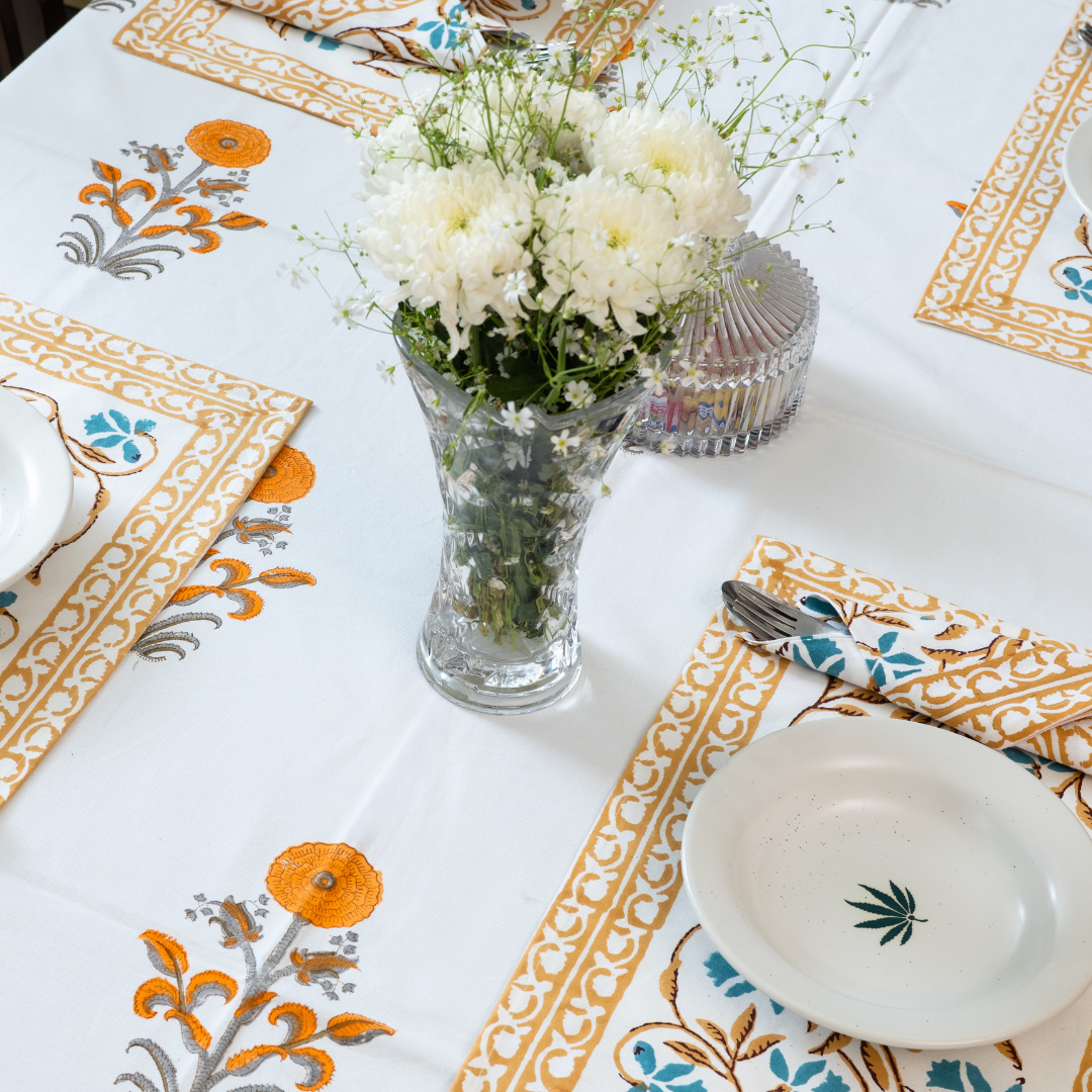 KalaIndia Orange Floral Mat Set – table mats with runner (folded stack view)