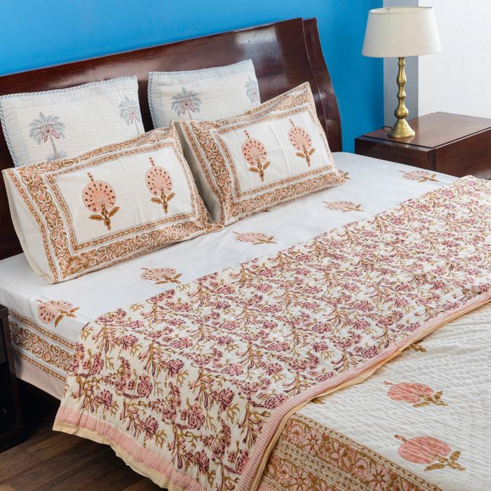 KalaIndia Peach Print Quilt – cotton quilt blanket (flat lay view)