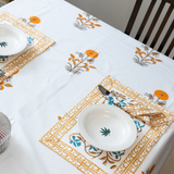 KalaIndia Yellow Floral Mat Set – table mats and runners (styled on a dining table)