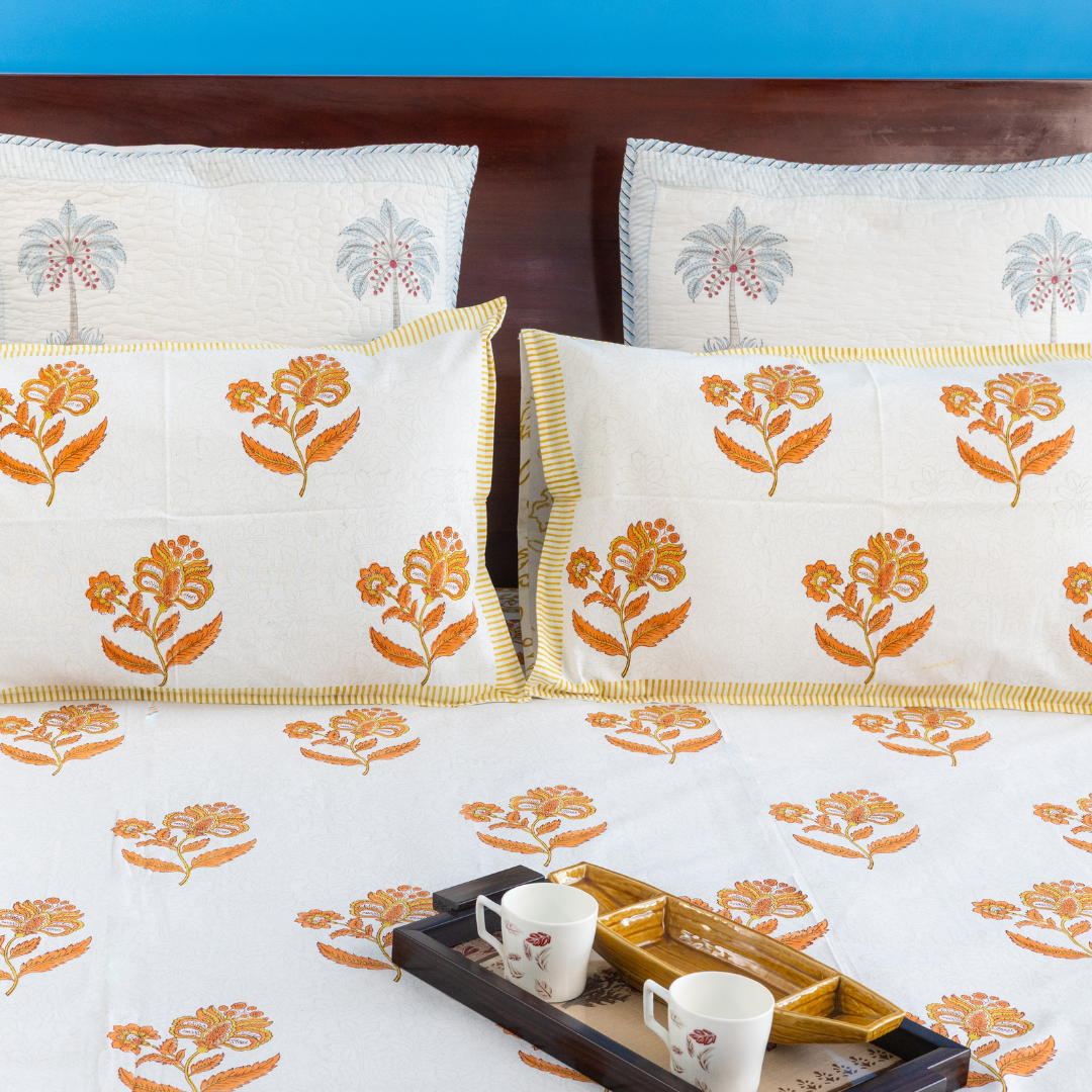 KalaIndia Yellow Leaf Print Bedsheet – floral bedsheet (styled on a bed)